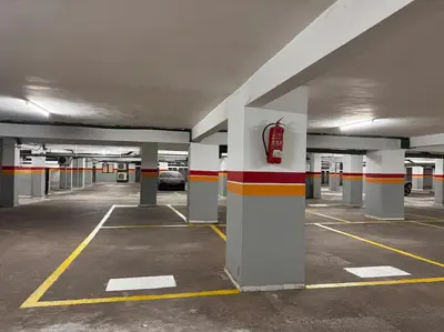 an empty parking lot with a car parked in it at Résidence Miramas Gueliz in Marrakech