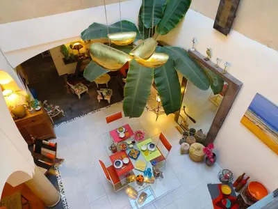 an overhead view of a living room with a plant at Riad Dom in Marrakech