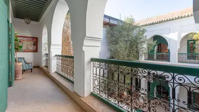 a balcony of a house with a fence at Dar Salam Marrakech in Marrakech