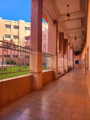 an empty hallway of a building with a courtyard at MARRAKECH CENTRE Appartement in Marrakech