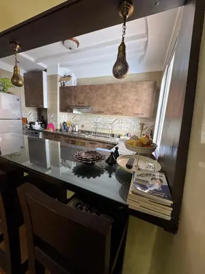a kitchen with a counter and a counter top at Authentic Apartment Riad style in Marrakech in Marrakech