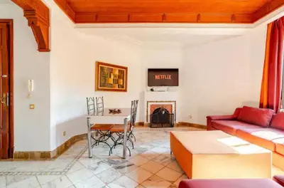 a living room with a couch and a table at Prestige authentique in Marrakech