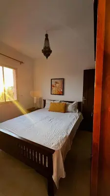 a bedroom with a large bed in a room at Bright with great view in Marrakech