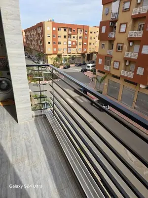arial view of a balcony of a apartment building at Cozy Apt Near Marrakech Airport in Marrakech