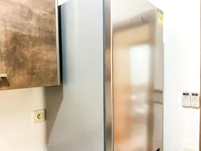 a stainless steel refrigerator in a room at Apartment in City Center - Gueliz in Marrakech