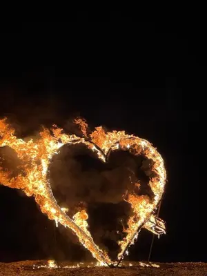 a heart is lit up on top of fire at Red Vibes Hostel Marrakech in Marrakech