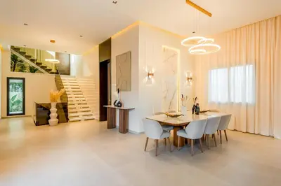 a dining room with a table and chairs at Luxury Villa Heated Pool, Cinema & Game Room in Marrakech