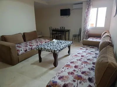 a living room with a couch and a coffee table at family apartment 34 in Marrakech