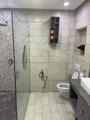a bathroom with a shower and a toilet at Villa Souzana in Marrakech