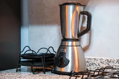 a blender sitting on top of a counter at Modern Appart , Parking , Pool & Fiber wifi , Hivernage City Centre in Marrakech