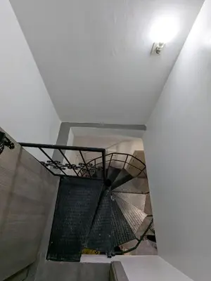 a staircase in a building with a ceiling at Dar SAÏDA in Marrakech