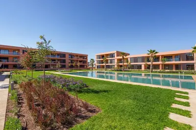an image of a swimming pool at a apartment complex at Le Noria - Super logement Jardin & Piscine - Golf in Marrakech