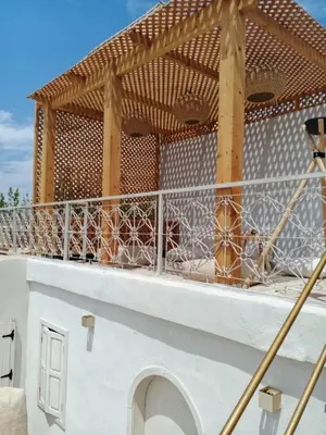 a group of animals sitting on top of a building at Riad Dar Sary Marrakech médina privé 3 chambres in Marrakech