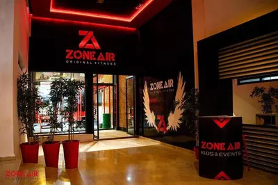 a building with a zona air sign on the door at Appartement ZAHRA HOME in Marrakech