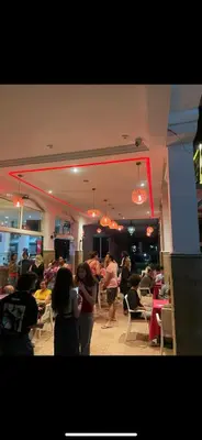 a group of people standing in a restaurant at Riad abdel in Marrakech
