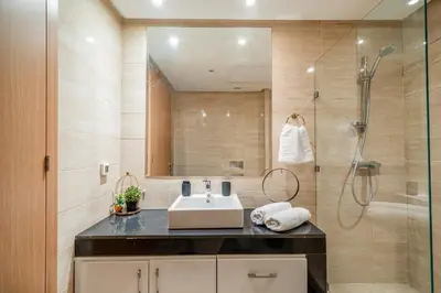 a bathroom with a sink and a shower at Your Haven of Peace with Private Jacuzzi in Marrakech
