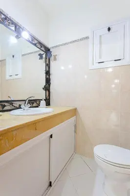 a bathroom with a sink and a toilet at Spacious Family Flat in Marrakech