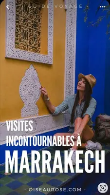 a woman in a hat sitting on a wall at Appartement, Gueliz, WiFi, parking in Marrakech