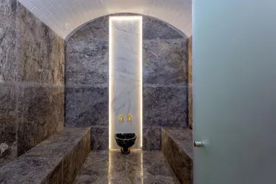 a bathroom with a toilet in the middle of a wall at Villa Esma in Marrakech