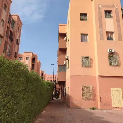 an alley between two buildings next to a building at Saada 15 marrakech in Marrakech
