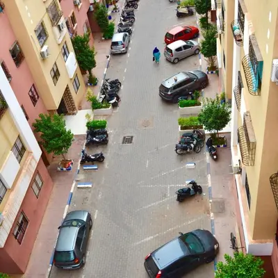 an aerial view of cars parked in a parking lot at Gold Holidays 02 in Marrakech