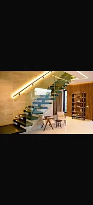 a staircase in a room with a bench and a table at Villa coco in Marrakech