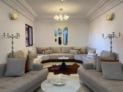 a large living room with couches and a table at Warda 2 Bedroom Hivernage Apartment in Marrakech