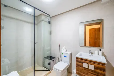 a bathroom with a shower and a toilet and a sink at Duplex 5 Chambres à Marrakech Luxe, Vue Piscine in Marrakech