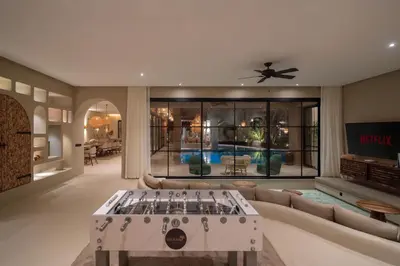 a living room with a stove in the middle at Villa Bali Amelkis in Marrakech