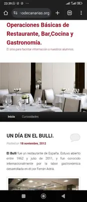 a website for a restaurant with a table and chairs at Al andalous in Marrakech