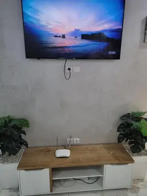 a flat screen tv hanging on a wall at japoniya in Marrakech