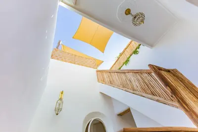 a view from the stairs of a house at Riad JONCHÈRES in Marrakech
