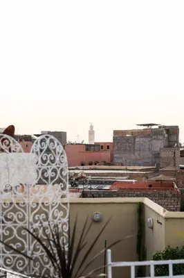 a view of a city from a balcony at Riad GALFANE in Marrakech