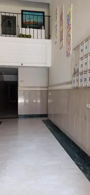 an empty room with a large room with tile floors at Picasso - Appartement 1 chambre in Marrakech