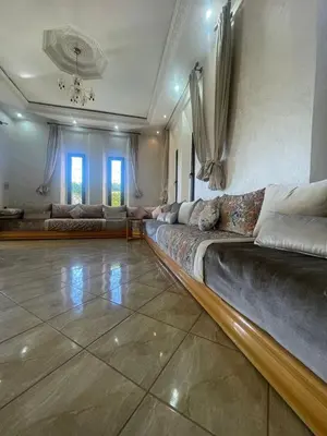 a large living room with a large couch in it at Villa Marrakech avec Piscine in Marrakech