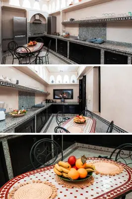 a kitchen with a plate of fruit on a table at Riad Sahar Privé - Piscine Chauffée Sup - PDJ Inclus in Marrakech