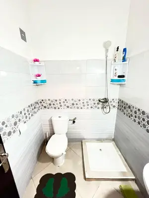 a bathroom with a toilet and a sink at luxury marrakech in Marrakech