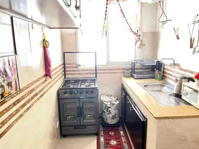 a kitchen with a stove and a sink at luxury marrakech in Marrakech