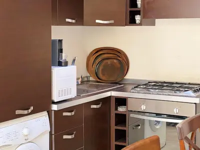 a kitchen with a stove and a microwave at Stylish Stay downtown in Marrakech