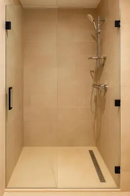 a shower stall with a glass door in a bathroom at Noria Golf - séjour chic et zen à Marrakech in Marrakech