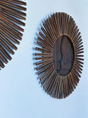 a close up of a comb on a blue background at Riad Dar Rafaël in Marrakech