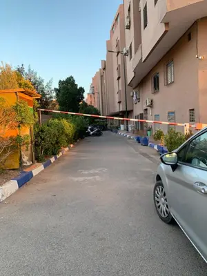 a car parked in a parking lot with a police tape at welcom to Marrakech in Marrakech
