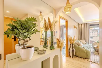 a living room with potted plants on a counter at Central Luxury Quiet Hivernage 2 Balconies With View in Marrakech
