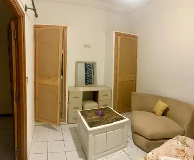 a living room with a couch and a table at Maison Marrakech in Marrakech