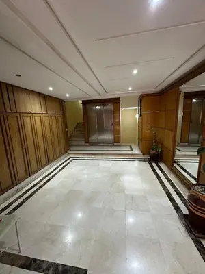 an empty room with a staircase in a building at Appartement chaleureux au cœur de Marrakech in Marrakech