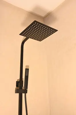 a black lamp with white polka dots on it at Suite Atlas - Douceur et confort in Marrakech