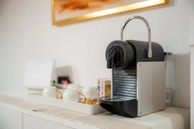 a toaster sitting on top of a kitchen counter at Hivernage, piscine & jardin privé in Marrakech