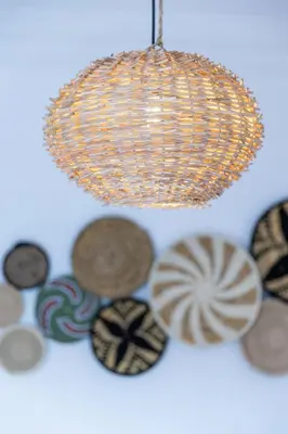 a chandelier with a bunch of buttons on a table at Modern & Chic Apartment in Gueliz, Marrakech in Marrakech