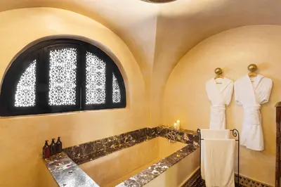 two mannequins are on display in a room at PL Place Boutique Hôtel & Restaurant in Marrakech