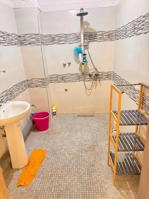 a bathroom with a shower and a sink at Appartement Marrakech in Marrakech